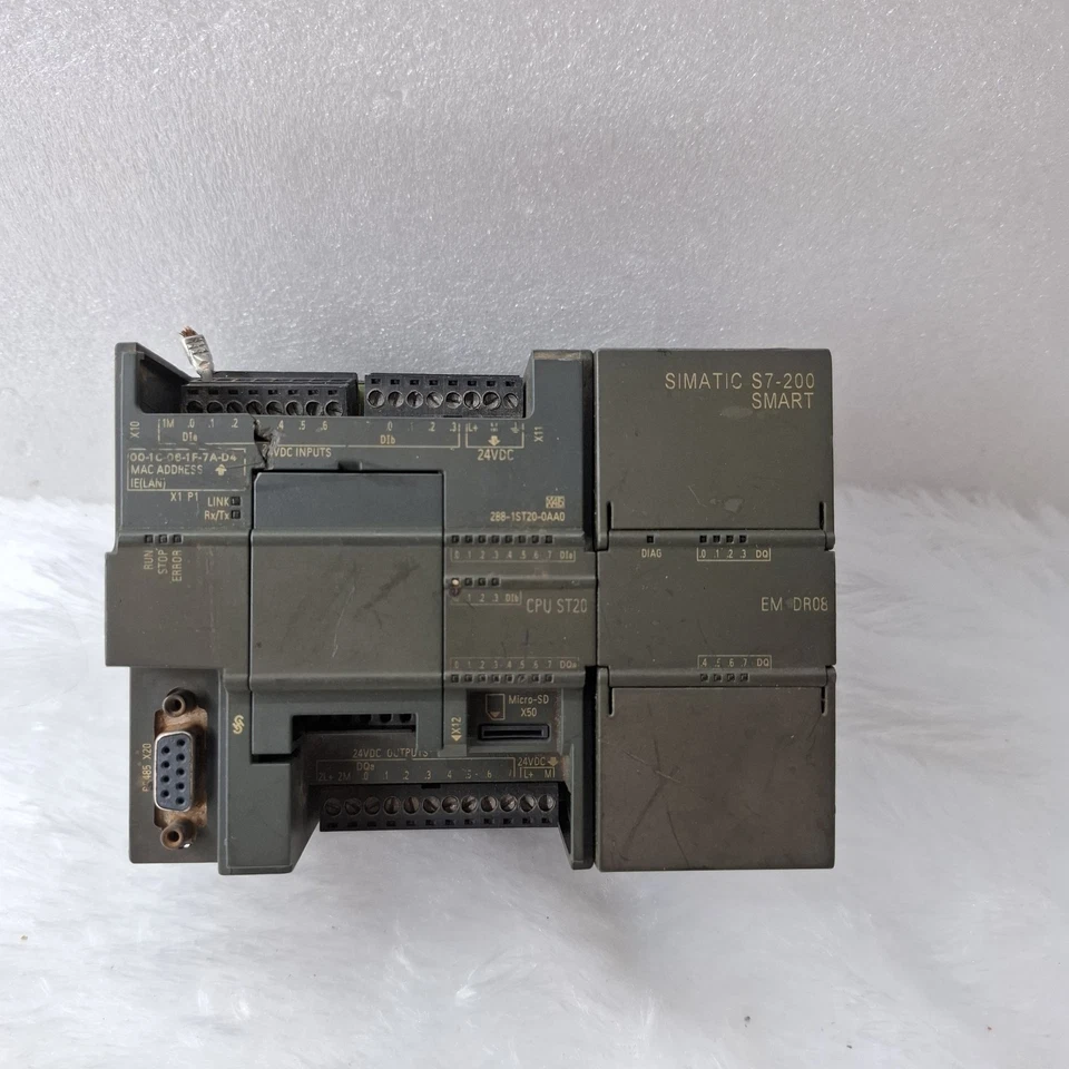 USED COSMETIC DAMAGED SIEMENS SIMATIC S7-200 CPU ST20 WITH EM DR08 MODULE